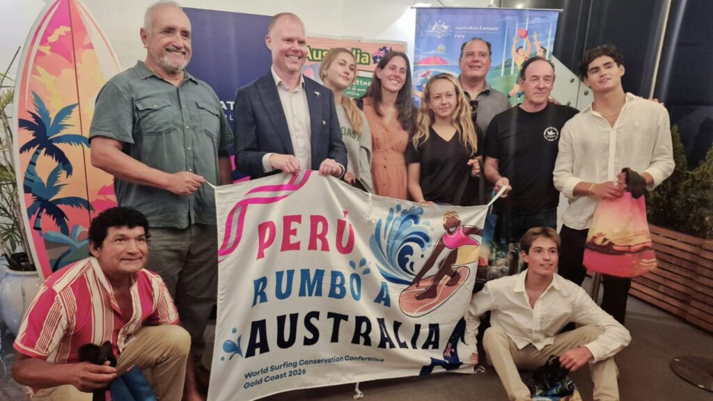 Peruvian delegation with official banner for the World Surfing Conservation Conference 2026.